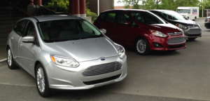 A Ford Focus Electric, C-MAX Energy and C-MAX Hybrid outside Palisade restaurant in Seattle on May 30, 2013