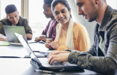 People working on a computer - Customer Success Manager Solar Industry